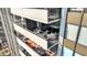 The balconies on this high rise condo have tables and chairs for outdoor dining and entertaining at 4000 N Meridian St # 9E, Indianapolis, IN 46208