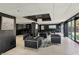 Upscale common room boasts modern furnishings, a sleek bar area, and serene outdoor views, ideal for relaxation and entertainment at 4000 N Meridian St # 9E, Indianapolis, IN 46208
