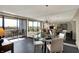 Open floorplan of dining area and living room with balcony at 4000 N Meridian St # 9E, Indianapolis, IN 46208