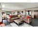 Spacious living room with a large sofa and kitchen area at 4000 N Meridian St # 9E, Indianapolis, IN 46208