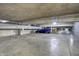 Well-lit parking garage featuring designated parking spots and ample space for vehicles and bikes at 4000 N Meridian St # 9E, Indianapolis, IN 46208