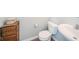 Compact half bathroom featuring neutral wall paint and a pedestal sink offers a functional and stylish powder room at 403 N Crystal Dr, Fortville, IN 46040