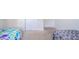 Bedroom featuring carpeted floors, closet space, and abundant natural light creates a welcoming and serene atmosphere at 403 N Crystal Dr, Fortville, IN 46040