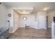 Spacious entryway with hardwood floors, neutral paint, and ample storage space for a clean and organized entrance at 403 N Crystal Dr, Fortville, IN 46040