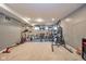 Basement gym is equipped with a variety of weight-lifting and cardio machines plus a punching bag at 403 N Crystal Dr, Fortville, IN 46040