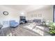 This bright living area features modern decor, comfortable seating, and lots of natural light at 403 N Crystal Dr, Fortville, IN 46040