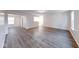 Spacious living room with hardwood floors with views through the home at 4046 Denali Dr, Indianapolis, IN 46235