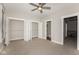 An airy bedroom with neutral tones and carpeted floor plus closet and en suite bath at 4077 Rookwood Ave, Indianapolis, IN 46208