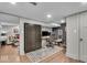 Basement area offers great work-from-home solutions or recreation space with view into adjoining living area at 4125 Rookwood Ave, Indianapolis, IN 46208