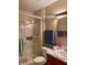 Bathroom with a shower stall, neutral walls, a standard toilet, vanity and sink at 4211 Medina Way, Indianapolis, IN 46227