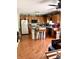 Functional kitchen with wood cabinets, laminate countertops, matching appliances and hardwood floors at 4211 Medina Way, Indianapolis, IN 46227