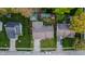 Aerial view of the property featuring the backyard, home, outbuilding, and landscaping at 4411 Rotterdam Dr, Indianapolis, IN 46228