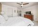 Bedroom with a dresser and a large bed and light colored walls at 5635 Pennycress Dr, Noblesville, IN 46062