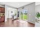 Bright breakfast nook with sliding glass door leading to the backyard at 5635 Pennycress Dr, Noblesville, IN 46062
