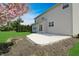 This home features a lovely backyard with a concrete patio, perfect for enjoying outdoor living at 5702 Saratoga Pl, Plainfield, IN 46168