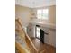 Bright, two-story foyer featuring a staircase, chandelier, and a view of the front door, creating a welcoming entrance at 5702 Saratoga Pl, Plainfield, IN 46168