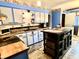 Bright kitchen featuring unique cabinets, modern appliances, and a functional center island at 5817 Oliver Ave, Indianapolis, IN 46241
