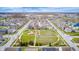 A sprawling community featuring homes, playgrounds, and walking trails nestled among tree-lined streets at 5954 Crowley Pkwy, Whitestown, IN 46075