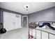 This gray bedroom is complete with a bed, shelving, and a double door closet at 5954 Crowley Pkwy, Whitestown, IN 46075