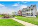 Street view of neighborhood with well-manicured lawns, mature trees, and charming houses at 5954 Crowley Pkwy, Whitestown, IN 46075