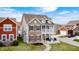Charming two-story home featuring a covered porch, well-manicured lawn, and a classic design at 5954 Crowley Pkwy, Whitestown, IN 46075