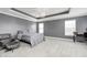 Large primary bedroom features neutral walls, tray ceiling and great natural light at 5954 Crowley Pkwy, Whitestown, IN 46075