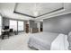 Spacious main bedroom with a sitting area, carpeted floors, and tray ceilings at 5954 Crowley Pkwy, Whitestown, IN 46075