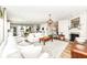 Spacious living area with fireplace and seamless transitions to kitchen and entry at 6040 Juniper Ct, Whitestown, IN 46075