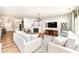 Bright living room featuring modern furniture, decor, and a fireplace at 6040 Juniper Ct, Whitestown, IN 46075