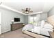 This is a great main bedroom with a ceiling fan, a dresser, and a television at 6040 Juniper Ct, Whitestown, IN 46075