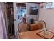 Finished basement area showing a wooden table and chairs and doorway leading to another room at 6180 Crittenden Ave, Indianapolis, IN 46220