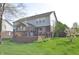 Spacious backyard with a large deck, perfect for outdoor entertaining and relaxation at 6527 Briarwood Pl, Zionsville, IN 46077