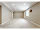 Finished basement with recessed lights, a window, and neutral carpeting at 6527 Briarwood Pl, Zionsville, IN 46077