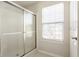 Bathroom featuring a shower with sliding glass doors at 6527 Briarwood Pl, Zionsville, IN 46077