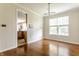 Dining room with hardwood floors and natural light at 6527 Briarwood Pl, Zionsville, IN 46077