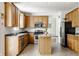 Well-equipped kitchen with stainless steel appliances and a functional center island at 6527 Briarwood Pl, Zionsville, IN 46077
