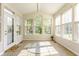 Bright sunroom with lots of natural light and beautiful windows at 6527 Briarwood Pl, Zionsville, IN 46077