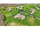 Aerial view of a house with a large yard, mature trees, and a curved driveway at 6829 Whitetail Woods Ct, Bargersville, IN 46106