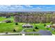 Sprawling one-story home with lush green lawns and mature trees in a scenic setting at 6829 Whitetail Woods Ct, Bargersville, IN 46106