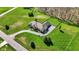 Beautiful home with large manicured lawns, mature trees, and a long driveway at 6829 Whitetail Woods Ct, Bargersville, IN 46106