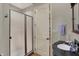Bathroom featuring glass shower door, marble floor tiles, and vanity sink at 6829 Whitetail Woods Ct, Bargersville, IN 46106