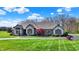 Charming one-story home features manicured lawn, brick accents, and a welcoming driveway at 6829 Whitetail Woods Ct, Bargersville, IN 46106