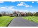 Charming one-story home features manicured lawn, brick accents, and a welcoming driveway at 6829 Whitetail Woods Ct, Bargersville, IN 46106