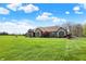 Stately single-story home with large front lawn and mature landscaping at 6829 Whitetail Woods Ct, Bargersville, IN 46106