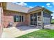 Brick home exterior with screened in porch and outdoor seating area at 6829 Whitetail Woods Ct, Bargersville, IN 46106