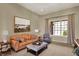 Cozy living room with ample natural light and neutral finishes at 6829 Whitetail Woods Ct, Bargersville, IN 46106