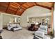 Open concept living room with vaulted ceilings, a fireplace, and lots of natural light at 6829 Whitetail Woods Ct, Bargersville, IN 46106