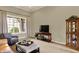 Comfortable living room with natural light and stylish furnishings at 6829 Whitetail Woods Ct, Bargersville, IN 46106