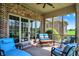 Relaxing screened porch featuring comfortable seating and views of the backyard at 6829 Whitetail Woods Ct, Bargersville, IN 46106