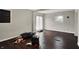 Living room with sliding glass door to outside at 7212 E Pleasant Run Pkwy S Dr, Indianapolis, IN 46219